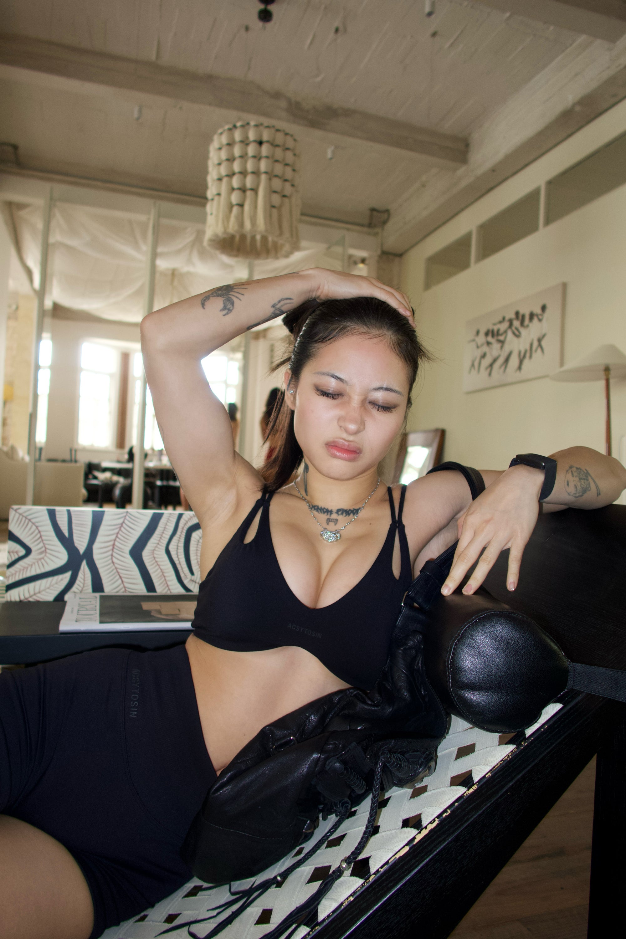 Orbit Bra in Black with Contour Shorts in Black— lifestyle photoshoot