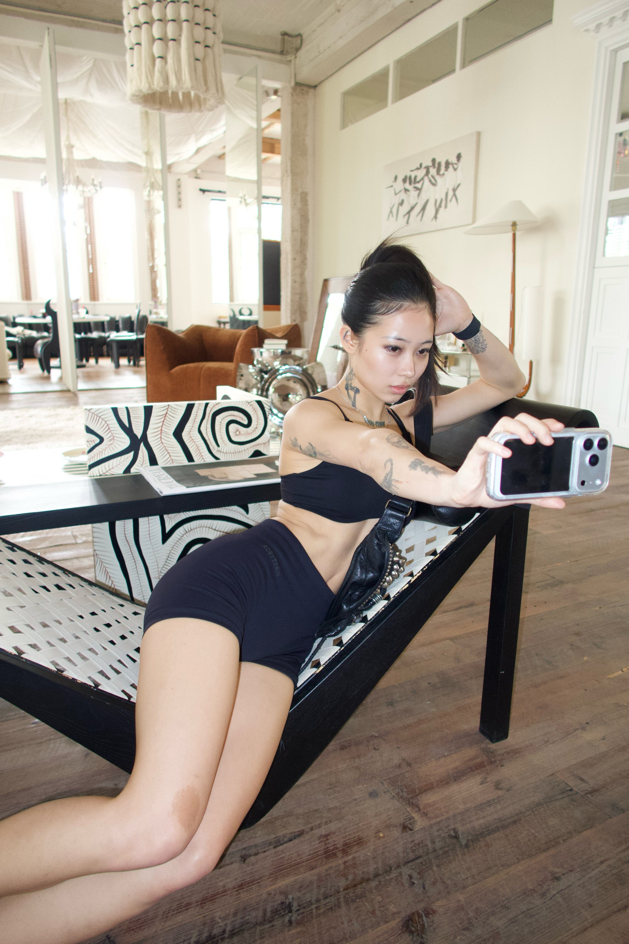 Orbit Bra in Black with Contour Shorts in Black— lifestyle photoshoot