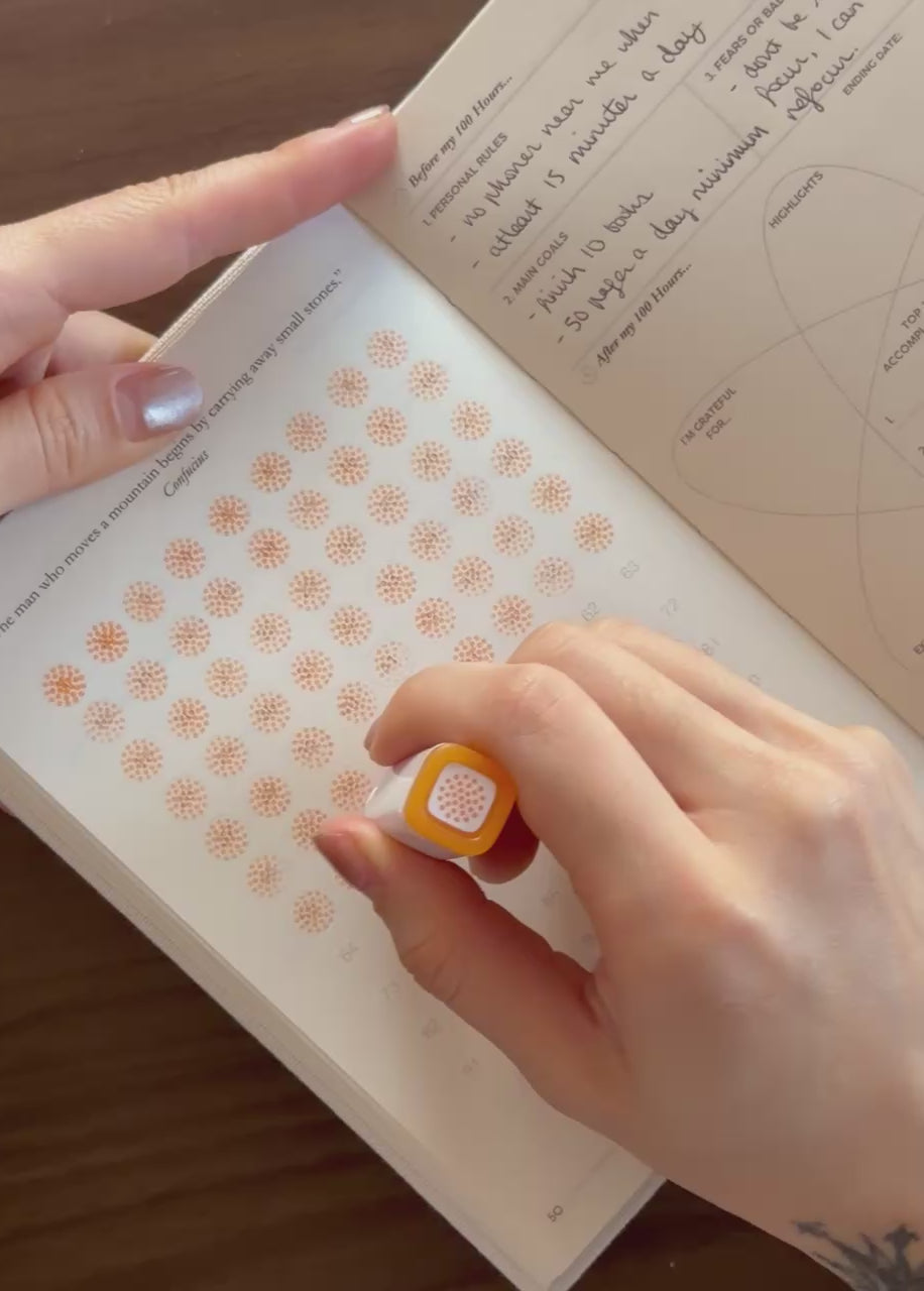 Video showing hand stamping inside the 10,000 Hours Tracker Book
